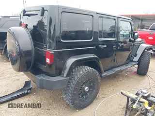 2014 Jeep Wrangler Unlimited Sahara with VIN 1C4HJWEG1EL202974, listed as a IAAI auction lot 41591870 with 17,174 mi miles. Bid and sale history available at carsss.com. Image 4.