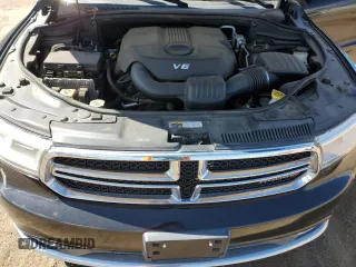 2014 Dodge Durango SXT with VIN 1C4RDJAG1EC972595, listed as a Copart auction lot 57133105 with 126,011 mi miles and Clean title. Bid and sale history available at DreamBid. Image 12.