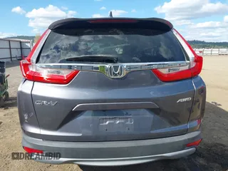 2018 Honda CR-V EX with VIN 2HKRW2H51JH664135, listed as a IAAI auction lot 42015075 with 94,996 mi miles. Bid and sale history available at carsss.com. Image 15.