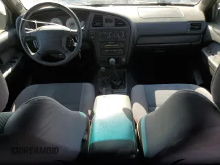 2001 Nissan Pathfinder SE с VIN JN8DR07Y71W520959, выставлен на аукционе Copart как лот 72599614 с пробегом 186 415 миль миль и Списание • Salvage title. История ставок и продаж доступна на DreamBid. Изображение 8.