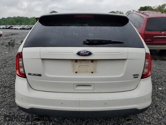 2013 Ford Edge SEL z VIN 2FMDK4JC6DBC06435, wystawiony jako Copart lot #54559065 z przebiegiem 163 407 mil mil oraz Szkoda całkowita • Salvage title. Historia ofert i sprzedaży dostępna na DreamBid. Obrazek 6.