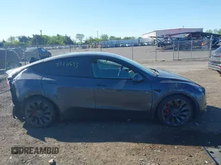 2022 Tesla Model Y Performance with VIN 7SAYGDEF9NF326944, listed as a IAAI auction lot 42111633 with Not Provided miles and . Bid and sale history available at DreamBid. Image 12.