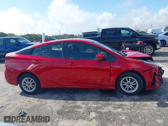 2021 Toyota Prius L Eco with VIN JTDKAMFU4M3145215, listed as a IAAI auction lot 41926274 with 74,220 mi miles. Bid and sale history available at carsss.com. Image 13.