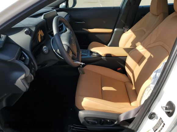 2025 Lexus UX with VIN JTHUCJDH6S2007491, listed as a Copart auction lot 52997175 with 1,042 mi miles and Salvage Title. Bid and sale history available at carsss.com. Image 7.