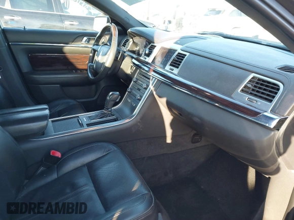 2012 Lincoln MKS with VIN 1LNHL9ER0CG801671, listed as a IAAI auction lot 41287565 with 137,903 mi miles. Bid and sale history available at carsss.com. Image 5.