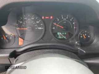 2009 Jeep Wrangler X with VIN 1J4FA24199L783458, listed as a Copart auction lot 56542705 with 236,840 mi miles and Salvage title. Bid and sale history available at DreamBid. Image 9.