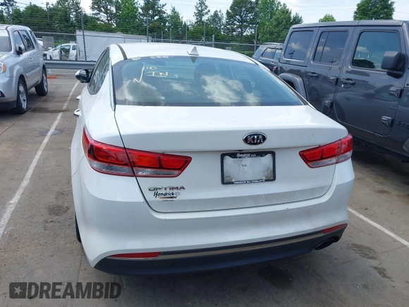 2016 Kia Optima LX with VIN 5XXGT4L34GG061718, listed as a IAAI auction lot 42176256 with 115,572 mi miles and . Bid and sale history available at carsss.com. Image 16.