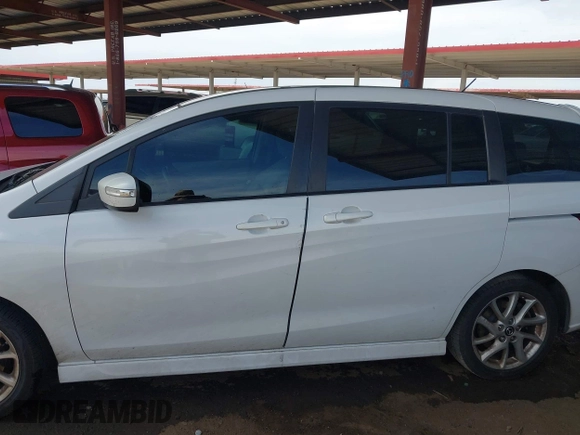 2013 Mazda 5 Touring with VIN JM1CW2CL0D0159894, listed as a IAAI auction lot 42386026 with 121,879 mi miles and . Bid and sale history available at DreamBid. Image 14.