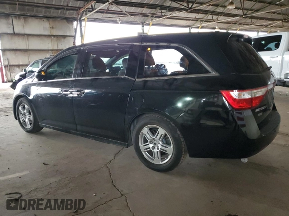 2012 Honda Odyssey Touring with VIN 5FNRL5H94CB026539, listed as a Copart auction lot 48925605 with 88,381 mi miles and Salvage Title. Bid and sale history available at DreamBid. Image 2.