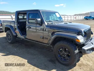2023 Jeep Gladiator Sport S with VIN 1C6HJTAG2PL575276, listed as a IAAI auction lot 42056473 with 17,043 mi miles and . Bid and sale history available at DreamBid. Image 1.