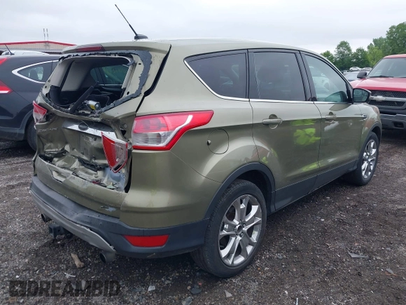 2013 Ford Escape SEL with VIN 1FMCU9H9XDUB61880, listed as a IAAI auction lot 42271136 with 115,837 mi miles and . Bid and sale history available at DreamBid. Image 4.