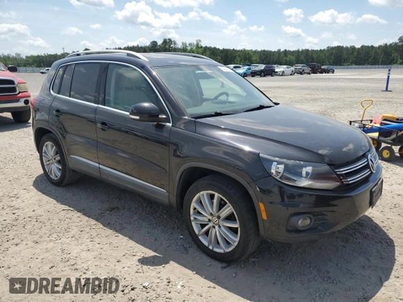 2012 Volkswagen Tiguan SEL with VIN WVGAV7AX2CW605399, listed as a Copart auction lot 55201935 with 128,527 mi miles and Clean Title. Bid and sale history available at DreamBid. Image 4.