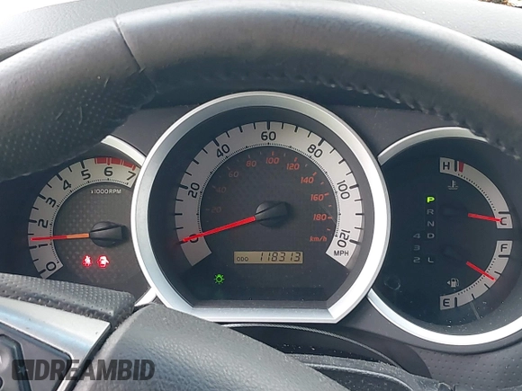2015 Toyota Tacoma with VIN 3TMLU4EN1FM201554, listed as a IAAI auction lot 42008012 with 118,313 mi miles and . Bid and sale history available at DreamBid. Image 7.