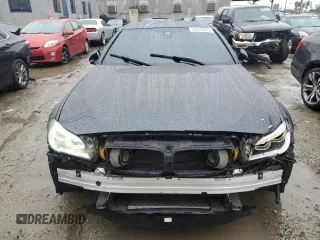 2014 BMW M5 with VIN WBSFV9C5XED593740, listed as a Copart auction lot 45210415 with 76,583 mi miles and Clean Title. Bid and sale history available at carsss.com. Image 5.