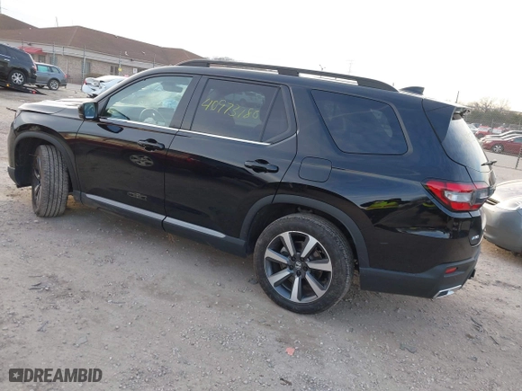 2024 Honda Pilot Touring with VIN 5FNYG1H72RB007519, listed as a IAAI auction lot 40973780 with 24,908 mi miles. Bid and sale history available at carsss.com. Image 3.