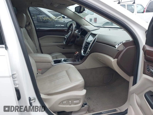 2013 Cadillac SRX Luxury Collection with VIN 3GYFNCE32DS527577, listed as a IAAI auction lot 41916467 with 137,462 mi miles and . Bid and sale history available at DreamBid. Image 5.