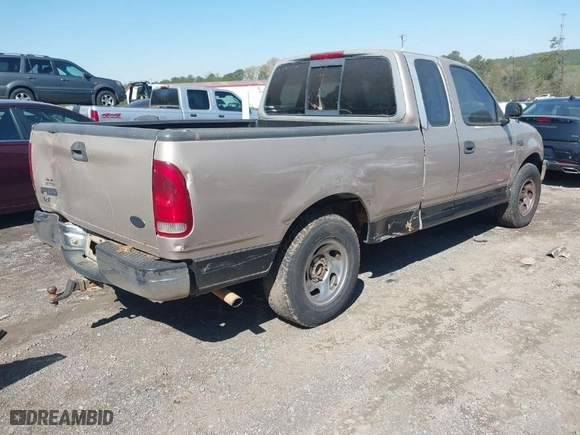 1998 Ford F-150 Standard with VIN 1FTZX1720WNB78292, listed as a IAAI auction lot 41881693 with 264,937 mi miles. Bid and sale history available at carsss.com. Image 4.