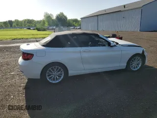 2015 BMW 2 Series 228i with VIN WBA1K5C51FV474079, listed as a Copart auction lot 57457875 with 62,946 mi miles and Salvage title. Bid and sale history available at DreamBid. Image 3.
