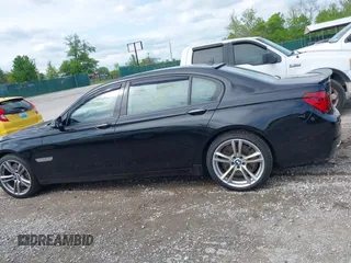 2013 BMW 7 Series 750Li z VIN WBAYE8C59DD133605, wystawiony jako IAAI lot #42179893 z przebiegiem 73 065 mil mil oraz . Historia ofert i sprzedaży dostępna na DreamBid. Obrazek 14.