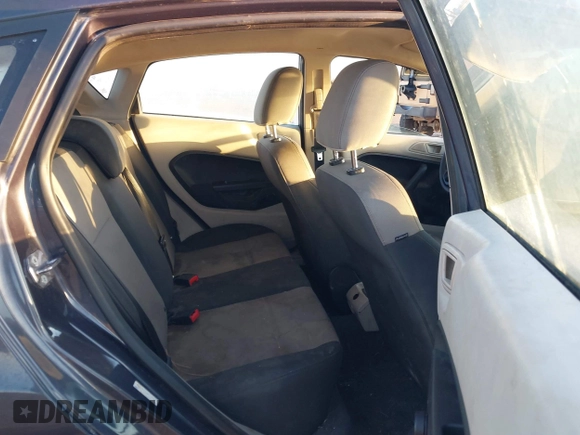 2013 Ford Fiesta S with VIN 3FADP4TJ8DM132523, listed as a IAAI auction lot 41700402 with 53,835 mi miles and . Bid and sale history available at DreamBid. Image 8.