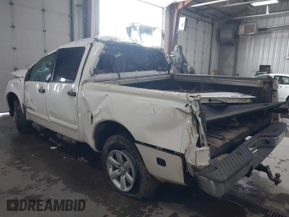 2013 Nissan Titan Pro-4X with VIN 1N6BA0EC7DN311469, listed as a IAAI auction lot 41945284 with 88,225 mi miles and . Bid and sale history available at DreamBid. Image 3.
