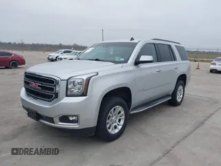 2015 GMC Yukon SLT with VIN 1GKS1BKC3FR253184, listed as a IAAI auction lot 41574610 with 152,543 mi miles. Bid and sale history available at carsss.com. Image 2.