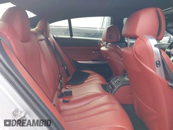 2015 BMW 6 Series 640i z VIN WBA6A0C51FD318982, wystawiony jako IAAI lot #41875547 z przebiegiem 60 968 mil mil oraz . Historia ofert i sprzedaży dostępna na DreamBid. Obrazek 8.