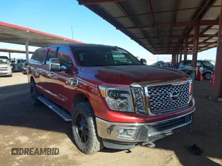 2017 Nissan Titan XD PRO-4X with VIN 1N6BA1F49HN534499, listed as a IAAI auction lot 41605098 with 71,399 mi miles. Bid and sale history available at carsss.com. Image 1.