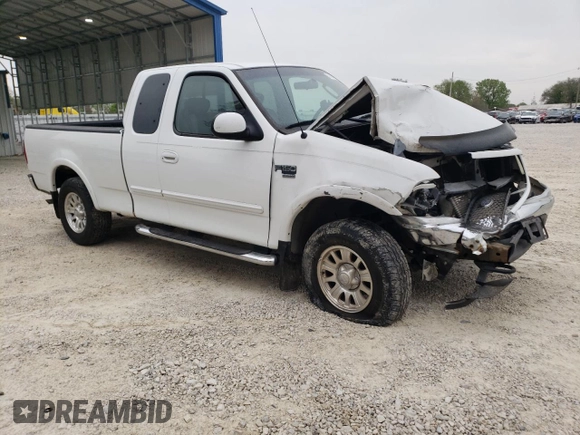 2002 Ford F-150 XL with VIN 1FTRX18L42NB60380, listed as a Copart auction lot 51806955 with 293,591 mi miles and Salvage title. Bid and sale history available at DreamBid. Image 4.