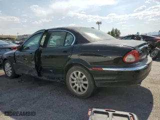 2003 Jaguar X-Type 2.5L Manual with VIN SAJEA51D63XD27469, listed as a Copart auction lot 78596624 with 158,231 mi miles and Salvage Title. Bid and sale history available at carsss.com. Image 2.