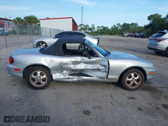 1999 Mazda MX-5 Miata with VIN JM1NB3534X0124237, listed as a IAAI auction lot 42536654 with 92,696 mi miles and . Bid and sale history available at DreamBid. Image 14.