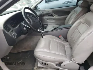 1997 Ford Thunderbird LX with VIN 1FALP62W1VH110468, listed as a Copart auction lot 88331705 with 84,349 mi miles and Salvage Title. Bid and sale history available at DreamBid. Image 7.