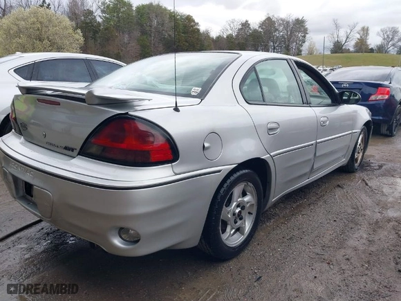 2004 Pontiac Grand Am GT with VIN 1G2NW52EX4C109231, listed as a IAAI auction lot 41845165 with 135,735 mi miles. Bid and sale history available at carsss.com. Image 4.