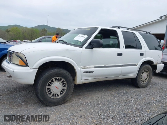 1999 GMC Jimmy SLE with VIN 1GKDT13WXX2521082, listed as a IAAI auction lot 42079903 with 160,055 mi miles. Bid and sale history available at carsss.com. Image 6.