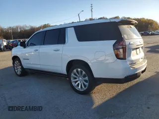 2022 Chevrolet Suburban Premier with VIN 1GNSKFKT7NR242288, listed as a Copart auction lot 79420734 with 77,006 mi miles and Salvage Title. Bid and sale history available at DreamBid. Image 2.
