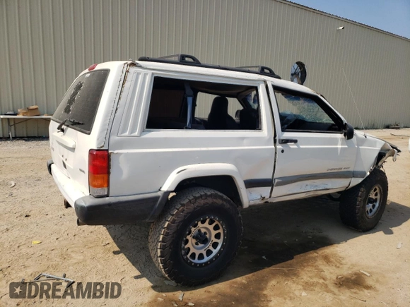 2001 Jeep Grand Cherokee with VIN 1J4FT47S21L596528, listed as a Copart auction lot 68641764 with Not provided miles and Salvage title. Bid and sale history available at DreamBid. Image 3.