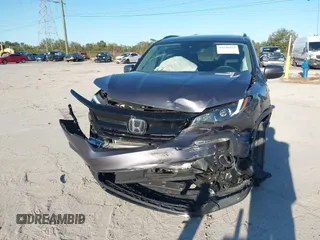 2022 Honda Pilot Special Edition with VIN 5FNYF5H25NB035016, listed as a IAAI auction lot 41248194 with 30,039 mi miles and . Bid and sale history available at DreamBid. Image 6.