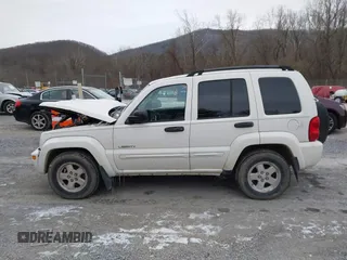 2004 Jeep Liberty Limited with VIN 1J4GL58K04W118653, listed as a IAAI auction lot 41369158 with 169,084 mi miles. Bid and sale history available at carsss.com. Image 14.