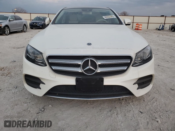 2019 Mercedes-Benz E-Class E 300 with VIN WDDZF4JB1KA512012, listed as a Copart auction lot 46902445 with 59,090 mi miles and Salvage Title. Bid and sale history available at carsss.com. Image 5.