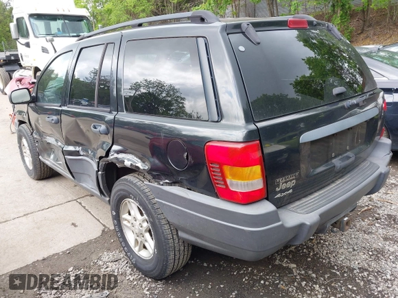2004 Jeep Grand Cherokee Laredo with VIN 1J8GW48S94C357443, listed as a IAAI auction lot 42309958 with 176,738 mi miles and . Bid and sale history available at DreamBid. Image 3.