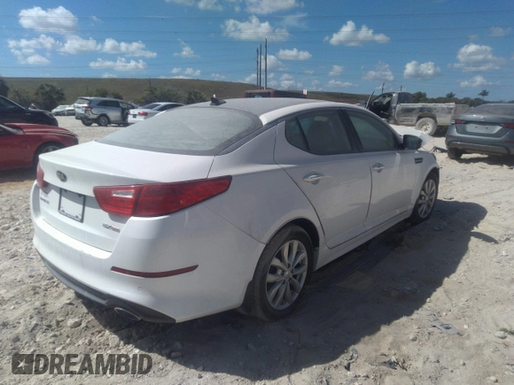 2015 Kia Optima EX with VIN 5XXGN4A71FG493648, listed as a IAAI auction lot 32483878 with Not provided miles and . Bid and sale history available at DreamBid. Image 4.