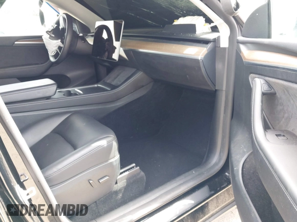 2023 Tesla Model Y Long Range z VIN 7SAYGDEE2PF863200, wystawiony jako IAAI lot #41805168 z przebiegiem 25 480 mil mil oraz . Historia ofert i sprzedaży dostępna na DreamBid. Obrazek 5.