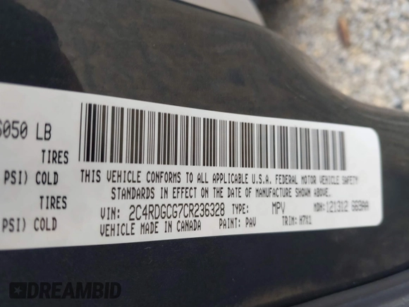 2012 Dodge Grand Caravan SXT with VIN 2C4RDGCG7CR236328, listed as a IAAI auction lot 42170991 with 72,831 mi miles and . Bid and sale history available at DreamBid. Image 9.