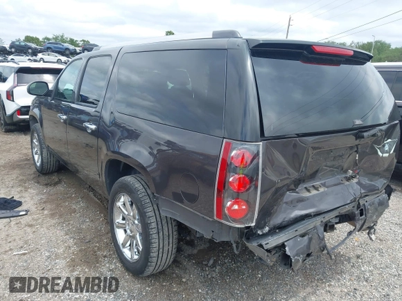 2011 GMC Yukon XL Denali with VIN 1GKS1MEF8BR279940, listed as a IAAI auction lot 41971157 with 218,597 mi miles. Bid and sale history available at carsss.com. Image 3.