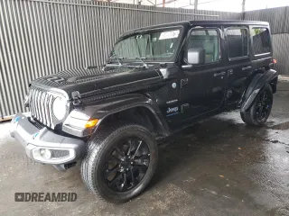 2023 Jeep Wrangler Sahara z VIN 1C4JJXP64PW704147, wystawiony jako Copart lot #59096975 z przebiegiem 45 122 mil mil oraz Czysty tytuł • Clean title. Historia ofert i sprzedaży dostępna na DreamBid. Obrazek 1.