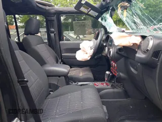 2012 Jeep Wrangler Unlimited Sport with VIN 1C4BJWDG8CL120308, listed as a IAAI auction lot 42365817 with 190,619 mi miles and . Bid and sale history available at DreamBid. Image 5.