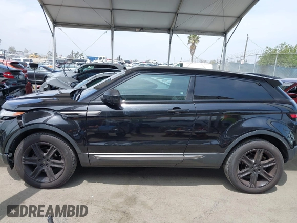 2014 Land Rover Range Rover Evoque Pure Plus with VIN SALVP1BGXEH866744, listed as a IAAI auction lot 42344957 with 86,602 mi miles and . Bid and sale history available at DreamBid. Image 14.