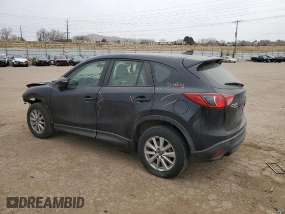 2016 Mazda CX-5 Sport with VIN JM3KE4BYXG0898807, listed as a Copart auction lot 48887985 with 71,418 mi miles and Salvage Title. Bid and sale history available at carsss.com. Image 2.