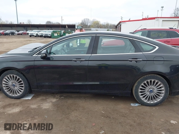 2015 Ford Fusion Titanium with VIN 3FA6P0K93FR223195, listed as a IAAI auction lot 42016806 with 94,312 mi miles. Bid and sale history available at carsss.com. Image 14.