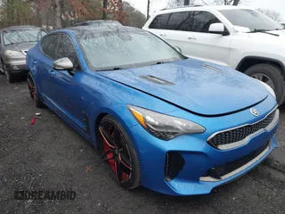 2018 Kia Stinger GT1 with VIN KNAE45LCXJ6018532, listed as a IAAI auction lot 41563629 with 91,043 mi miles. Bid and sale history available at carsss.com. Image 1.